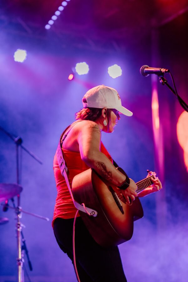 The Rick Lewis Band vocalist on acoustic guitar